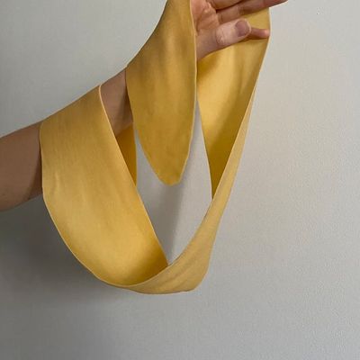 Close-up of hands in a graceful, flowing gesture.